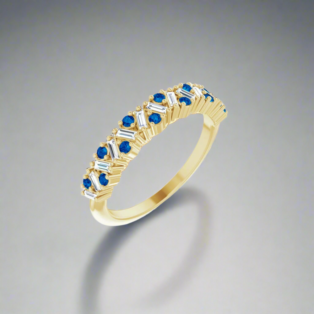 
                      
                        The Eloise Gemstone and Diamond Scattered Ring by Pear. is a luxurious piece featuring alternating rows of small, shimmering blue and white gemstones, meticulously set in delicate prongs along the band. Its intricate design and sparkling finish are both elegant and captivating, rivaling even the most exquisite diamonds.
                      
                    